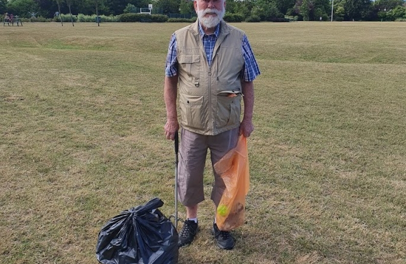 Cllr John Mylod litter picking in St. Andrew's Park