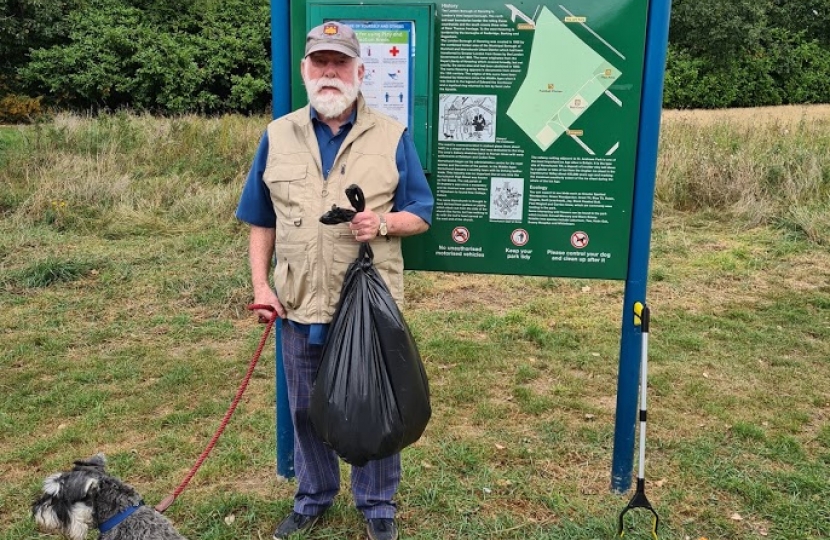 Cllr John Mylod litter picking in St. Andrew's Park